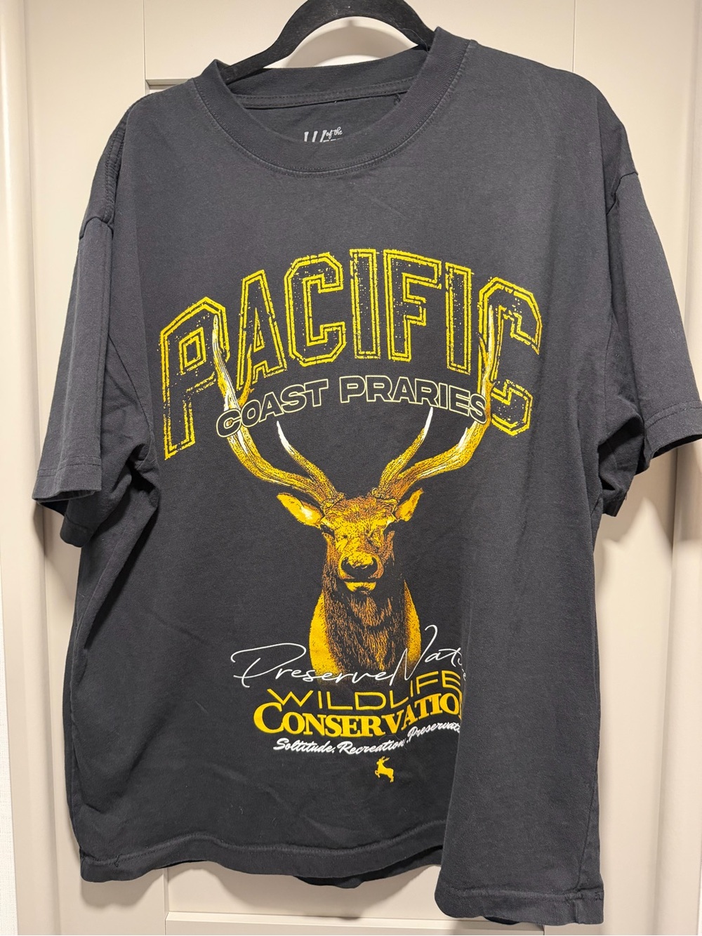 Western Frontier Black Short-Sleeve Tee with Yellow Wildlife Graphic